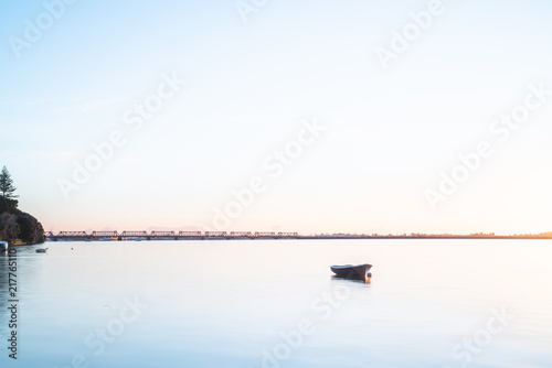 Tauranga Harbour sunrise  glow across water at dawn. © Brian Scantlebury