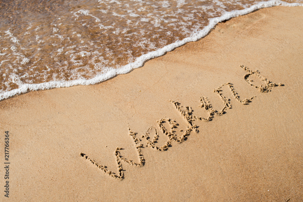 Fototapeta premium travel background with waves of sea, beach and word weekend