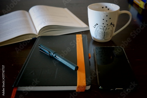 pencils, organizer, pot of coffee and the rest of the office equipment