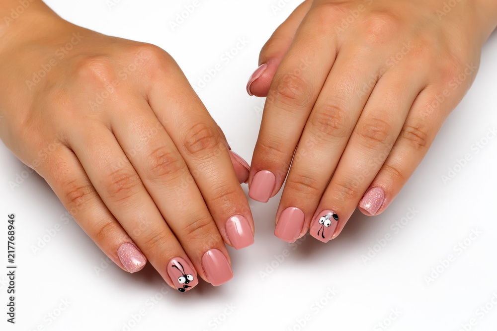 beige pink manicure with sequins and an ant on square short nails
beige pink manicure with sequins and an ant on square short nails