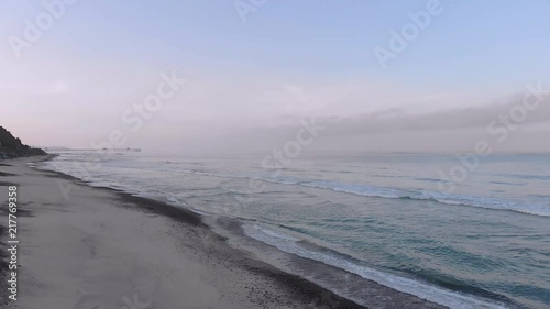 Lone Surfer on a Cold Morning Aerial shot