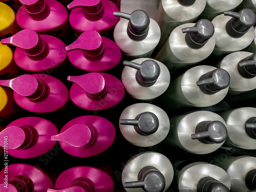 Canvas-taulu Pink And Silver Color Plastic Bottles In A Shopping Mall