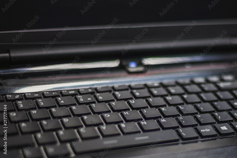 computer keyboard buttons on laptop, blurry, close up computer keyboard buttons on laptop, blurry, close up