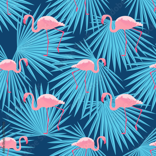 Pink flamingos and palm leaves. Seamless tropical summer pattern.