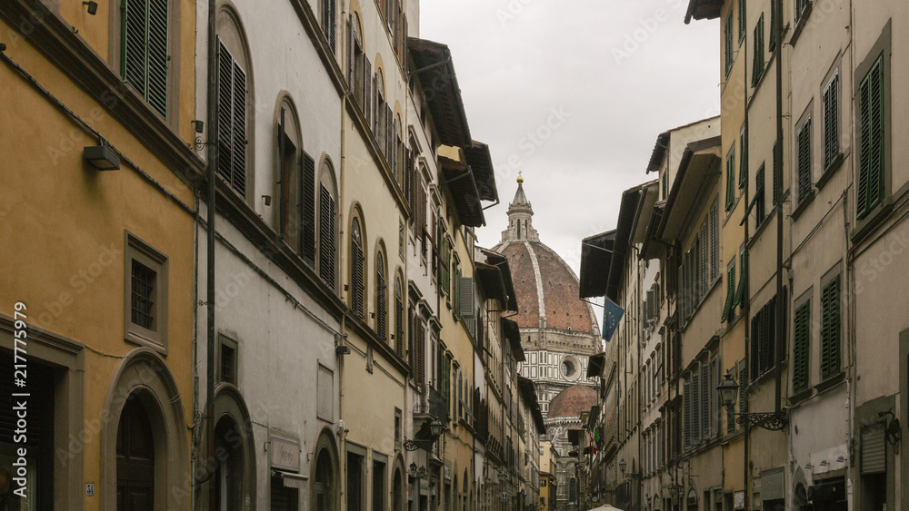 Street of Florence, Italy with the Dome of the Florence Cathedral