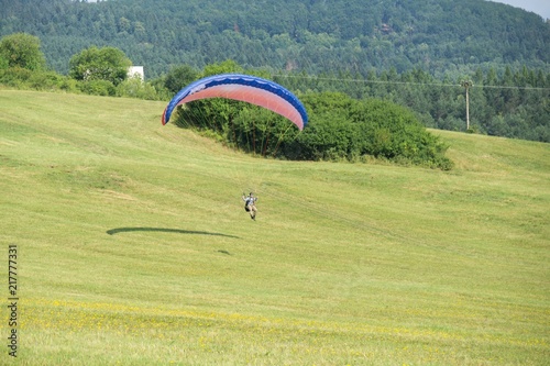 Paragliders on the meadow. Slovakia