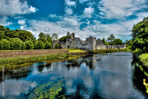The Desmond Castle in Adare beautifull Village, on the banks of the Maigue River, in Ireland, Co. Limerick. HDR Landscape photo
