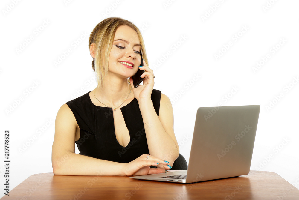 Girl businesswoman working behind laptop, computer and mobile phone isolated on white background Girl businesswoman working behind laptop, computer and mobile phone isolated on white background