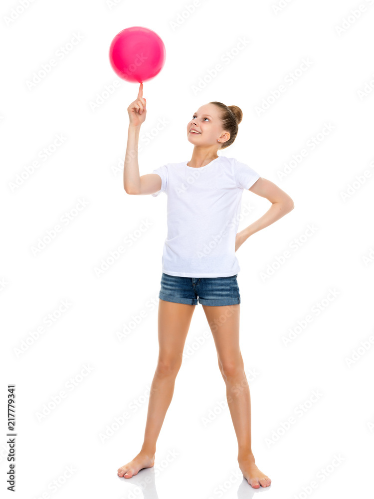 Girl gymnast performs exercises with the ball. Girl gymnast performs exercises with the ball.