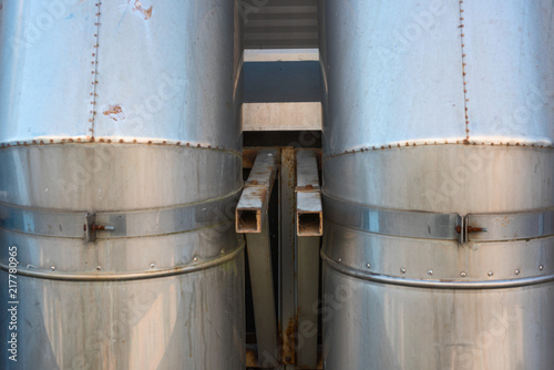 Tableau sur toile Metal industrial rusty airway pipes is close
