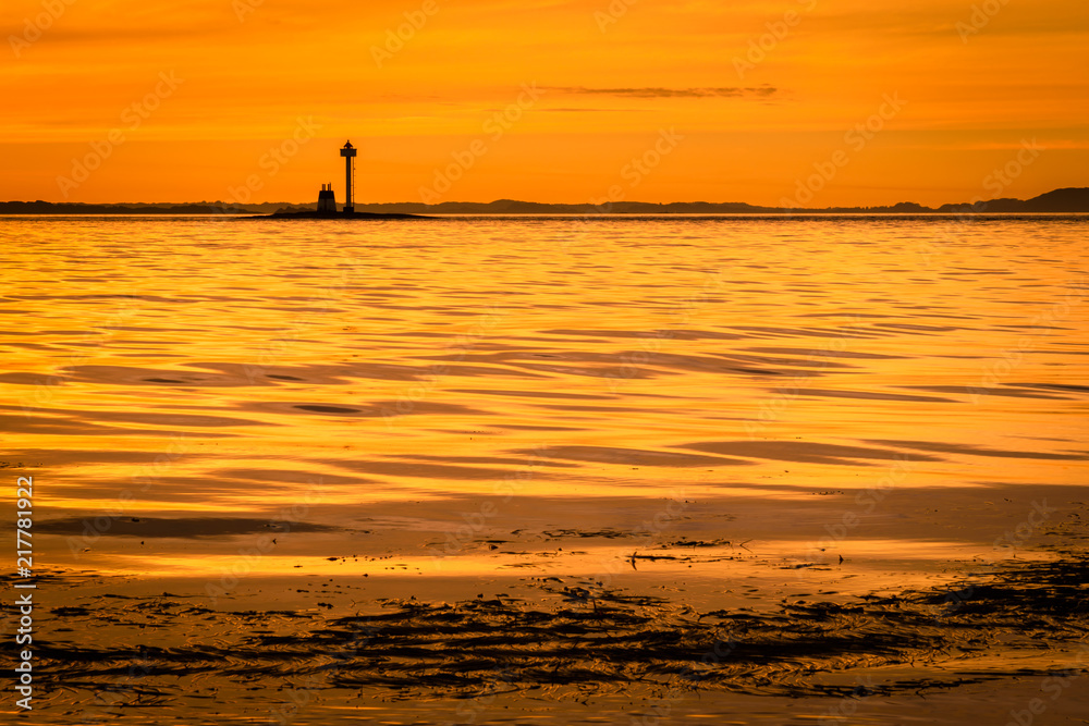 Yellow sunset along the coastline 