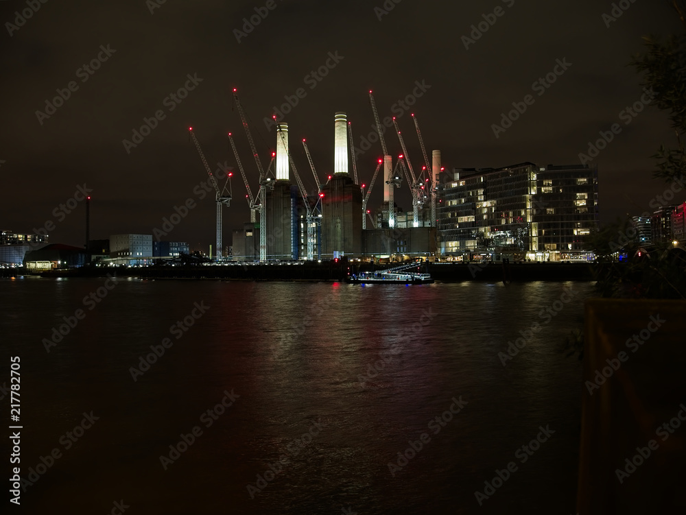 Urban night cityscape of River Thames and surrounding buildings. Urban night cityscape of River Thames and surrounding buildings.