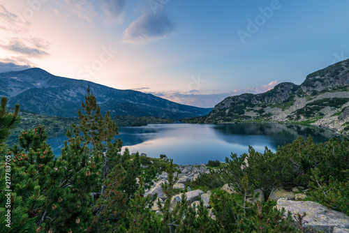 Popovo lake at Bezbog, Bulgaria and mountains reflection.