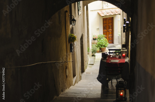 Romantic table for two in the historic center of Cortona, Tuscany, Italy, Europe