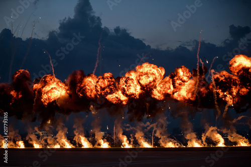 Airshow demonstrations with high explosive fire blasts photo