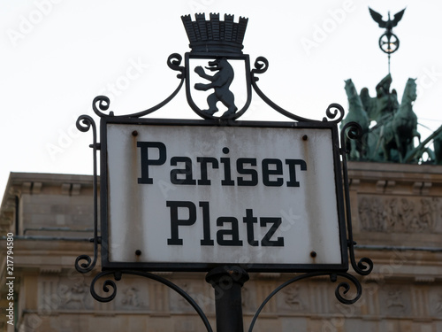 Old Street Sign Pariser Platz With The Quadriga of Brandenburg Gate In Background, Selected Focus © cbies