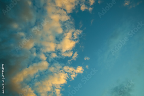 Detail of multicolor clouds at sunset as background.