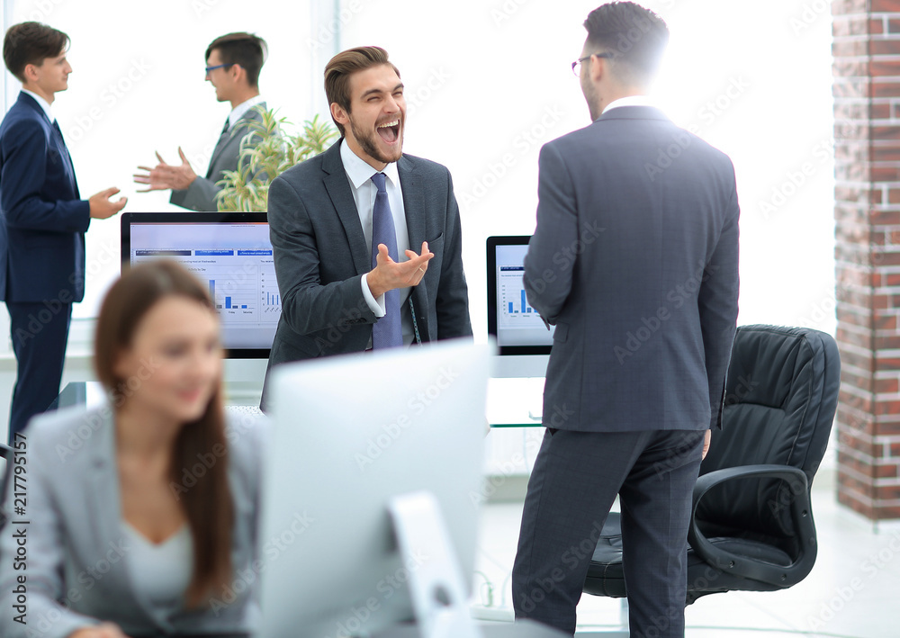 Group of business partners interacting during break Group of business partners interacting during break