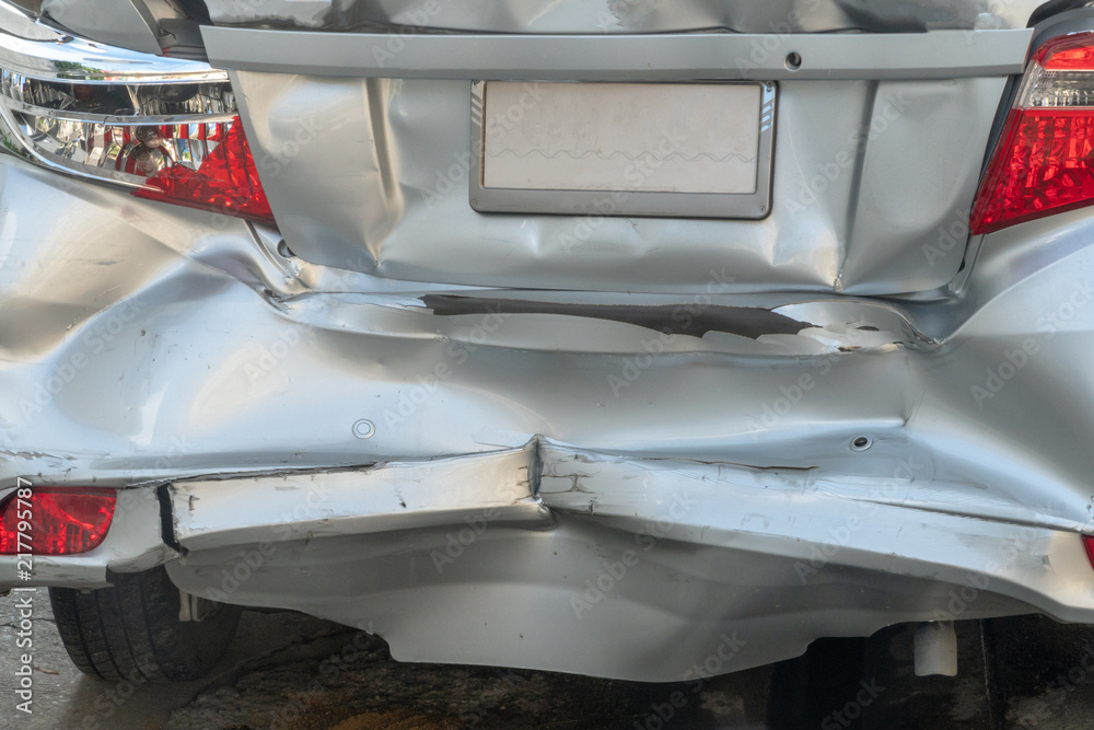 Backside of silver car get damaged by crash accident on the road. Backside of silver car get damaged by crash accident on the road.