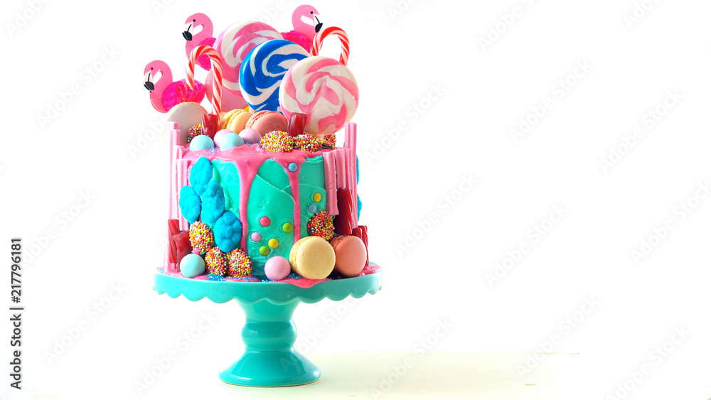 On-trend candyland fantasy drip cake for children's, teen's birthday, anniverary, mother's day and valentine's day celebrations, on white background.