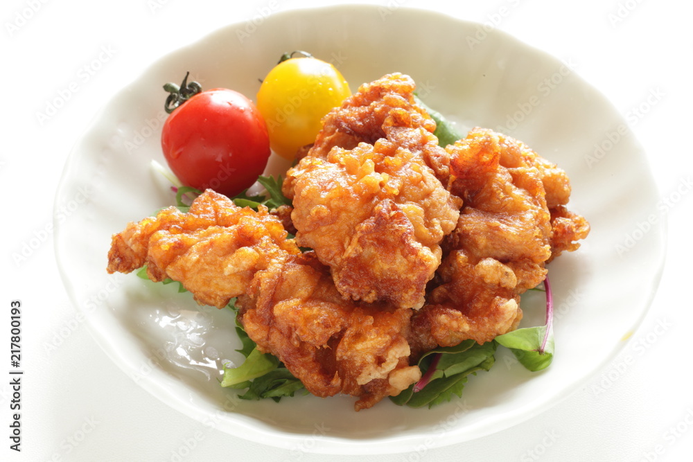 Homemade fried chicken served with cherry tomato Homemade fried chicken served with cherry tomato