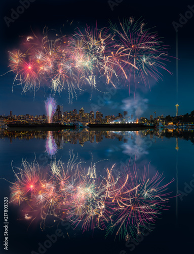 Seattle skyline and fireworks with reflections