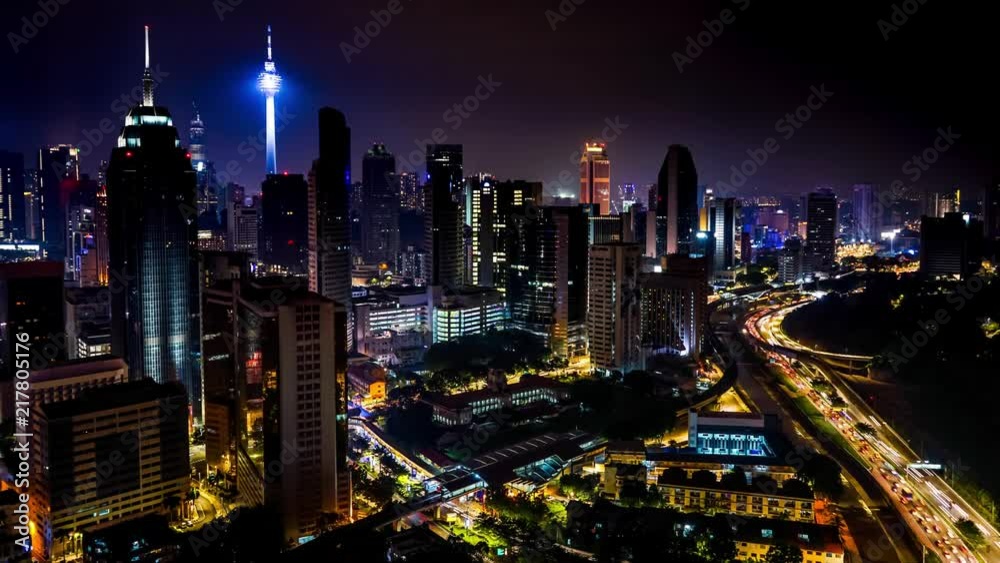 4k time lapse with cityscape of Kuala Lumpur city traffic with two towers on a background. Aerial view. 4k time lapse with cityscape of Kuala Lumpur city traffic with two towers on a background. Aerial view.
