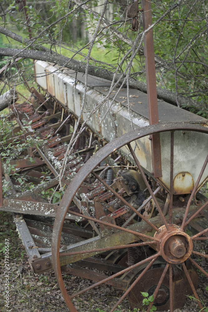 Abandoned rusted harvester