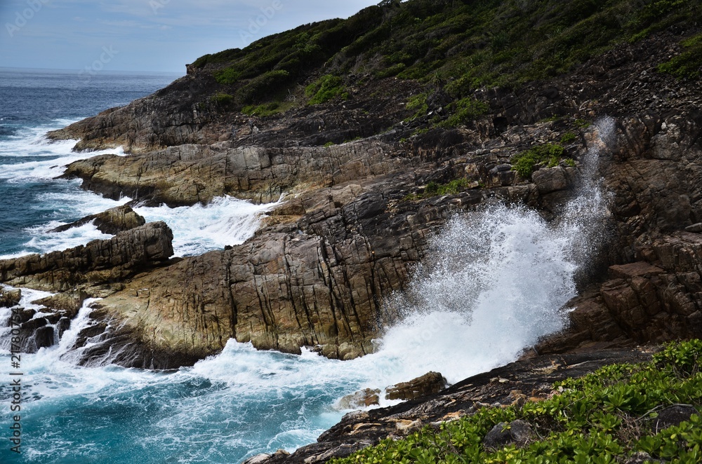 The beautiful sea view, wave crashing on the rock.