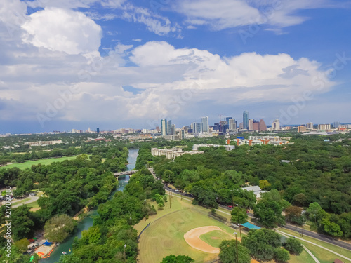 Aerial view Downtown from Barton Creek in Greenbelt at Zilker Metropolitan Park south Austin with summer blue cloud sky. Located at eastern edge of Hill Country, Austin the state capital of Texas, US. © trongnguyen