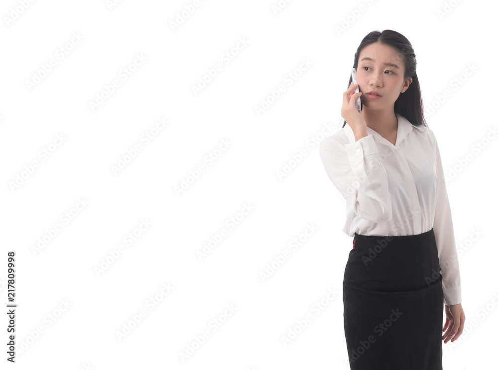 Beautiful asian business woman wearing white shirt and black skirt looking at camera and smile isolated on white background, side view, Free from copy space. Beautiful asian business woman wearing white shirt and black skirt looking at camera and smile isolated on white background, side view, Free from copy space.