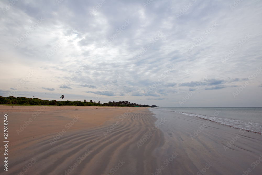 Swirling sand patterns on Nilaveli Beach in Trincomalee Sri Lanka Asia