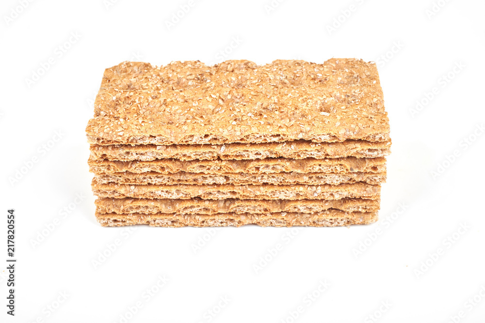 The healthy bread crisp isolated on white background The healthy bread crisp isolated on white background