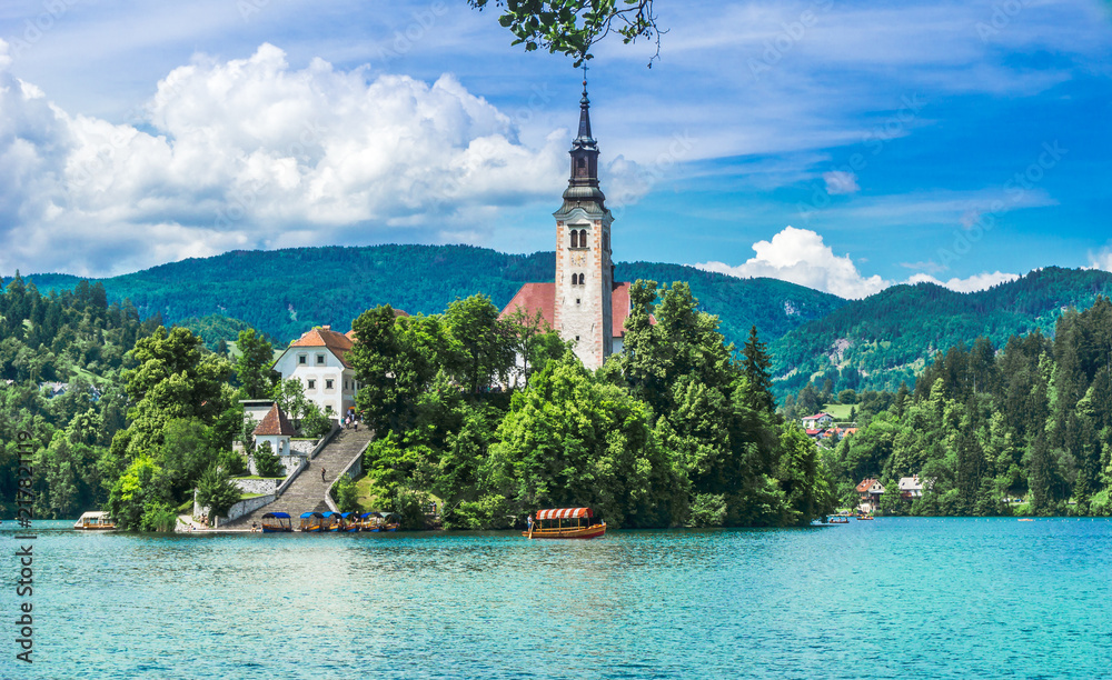 View on pilgrimage Church of the Assumption of Maria on an islamd of lake Bled - Slovenia