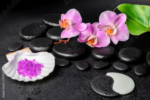 spa concept of zen and Yin-Yang stones, lilac orchid