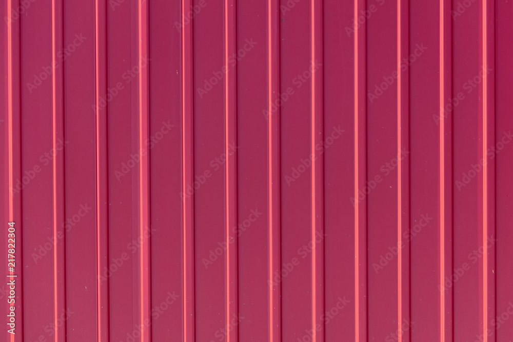Red metal sheet metal profile as background