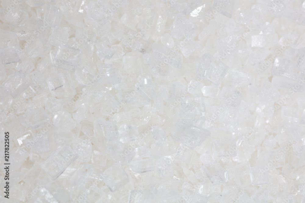 White granulated sugar as a background White granulated sugar as a background