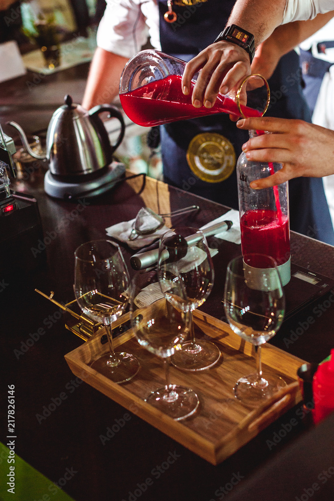 championship among coffee houses, members of teams show barista's skill, prepare drinks, teamwork