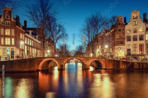 The bridges over the canal Leidse Gracht in the old town of Amsterdam photo