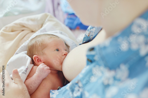 Mother breastfeeding baby