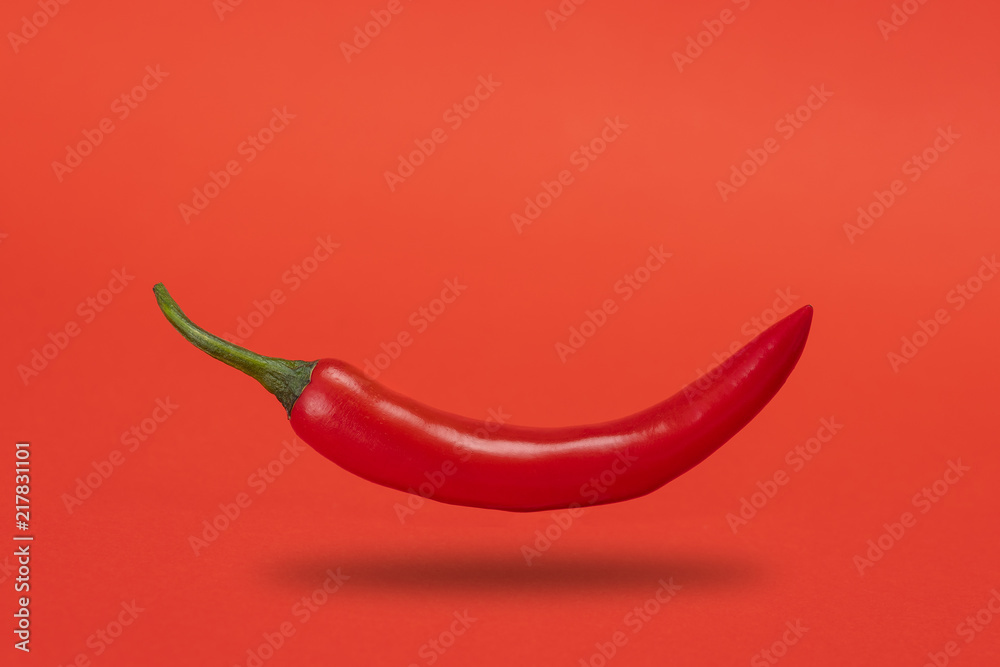 Floating red narrow long spicy chili pepper Floating red narrow long spicy chili pepper