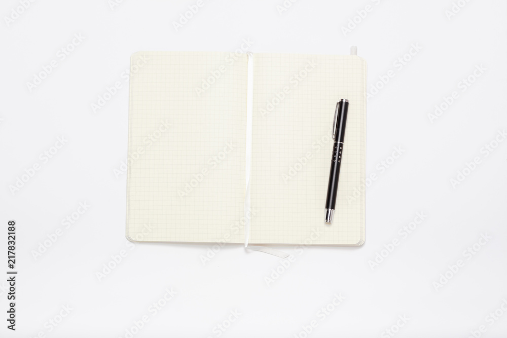 White notebook minimal image on white table White notebook minimal image on white table
