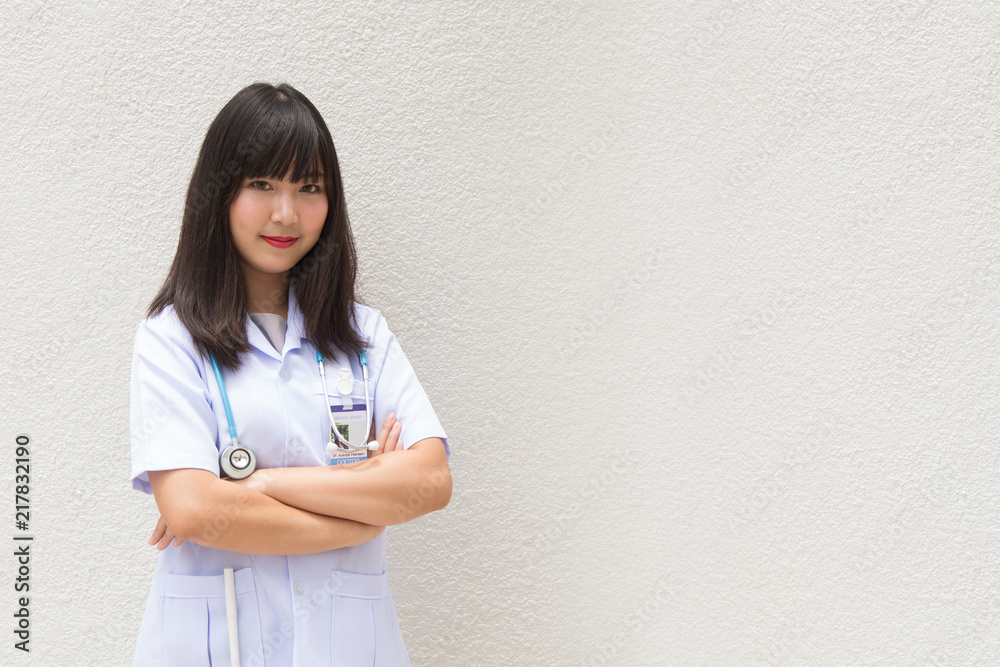 The woman Asian doctor White Shirt suit with stethoscope working outdoor Hospital. The woman Asian doctor White Shirt suit with stethoscope working outdoor Hospital.