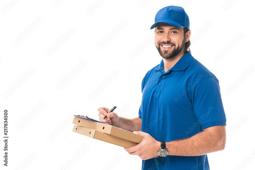 happy delivery man holding boxes with pizza writing on clipboard isolated on white happy delivery man holding boxes with pizza writing on clipboard isolated on white