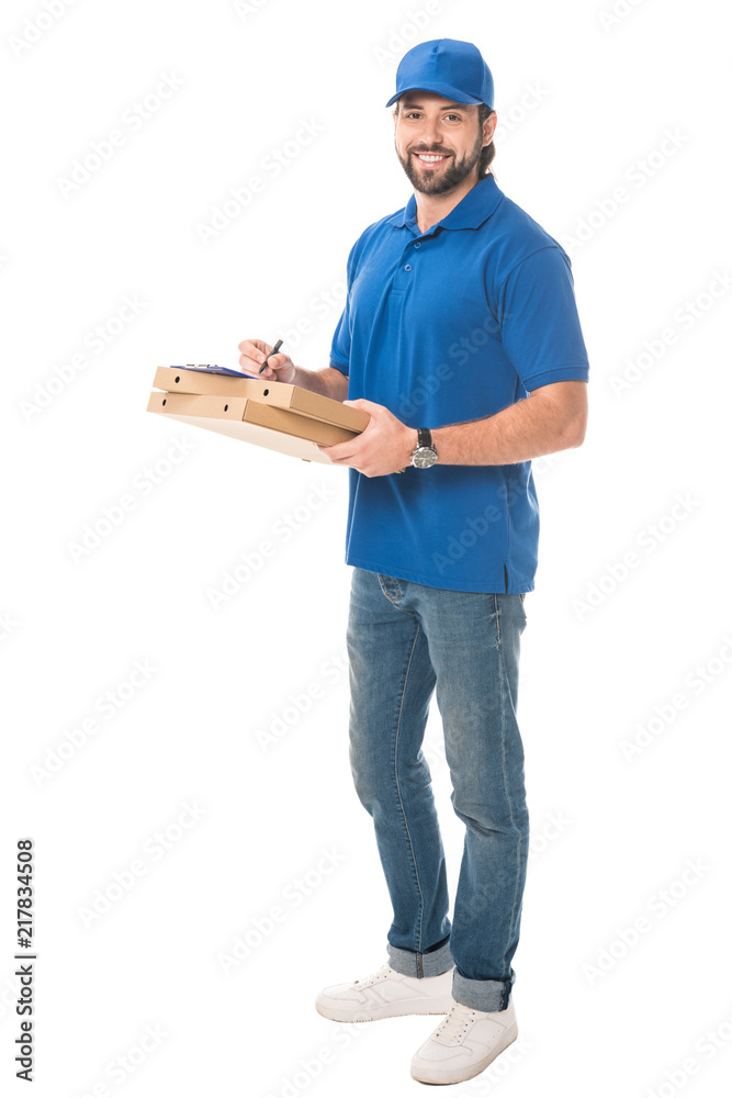 full length view of happy delivery man holding boxes with pizza writing on clipboard isolated on white full length view of happy delivery man holding boxes with pizza writing on clipboard isolated on white