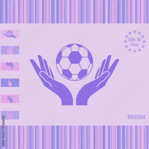 two hands hold football ball vector icon. Illustration on a flat design style. EPS 10