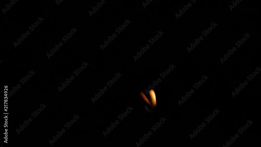 burning match in the dark, flame burning match in the dark, flame