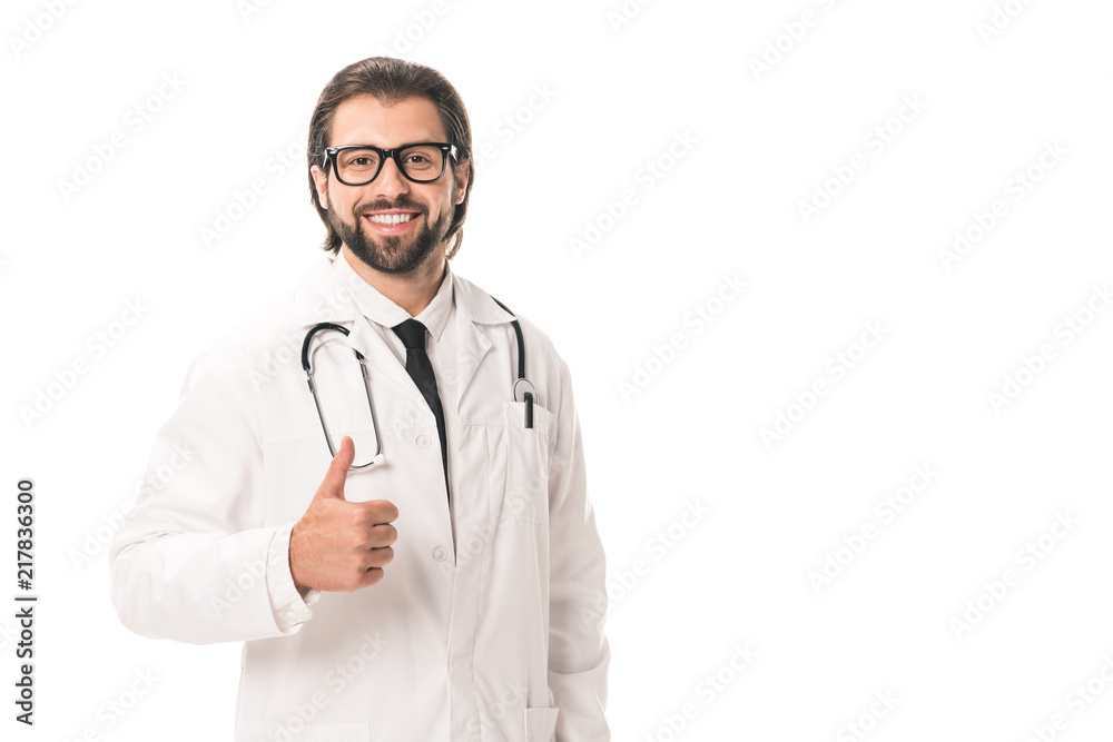 handsome doctor in eyeglasses and white coat showing thumb up and smiling at camera isolated on white handsome doctor in eyeglasses and white coat showing thumb up and smiling at camera isolated on white