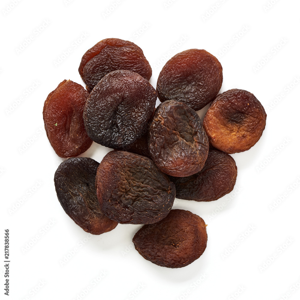 Sun dried apricots isolated on white background. Top view. Sun dried apricots isolated on white background. Top view.