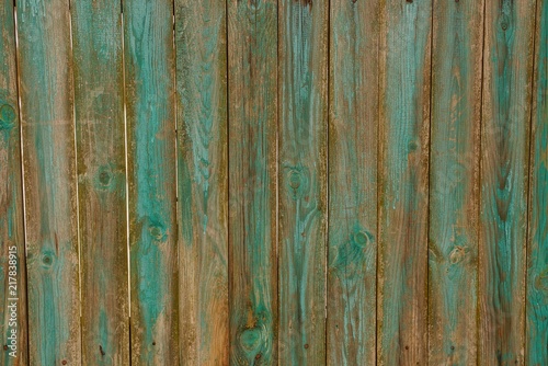 green brown wooden texture of old boards in the wall of a fence